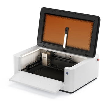 LaserPecker LX2 all-in-one laser cutter with top lid and front door open, showing internal 40W laser module