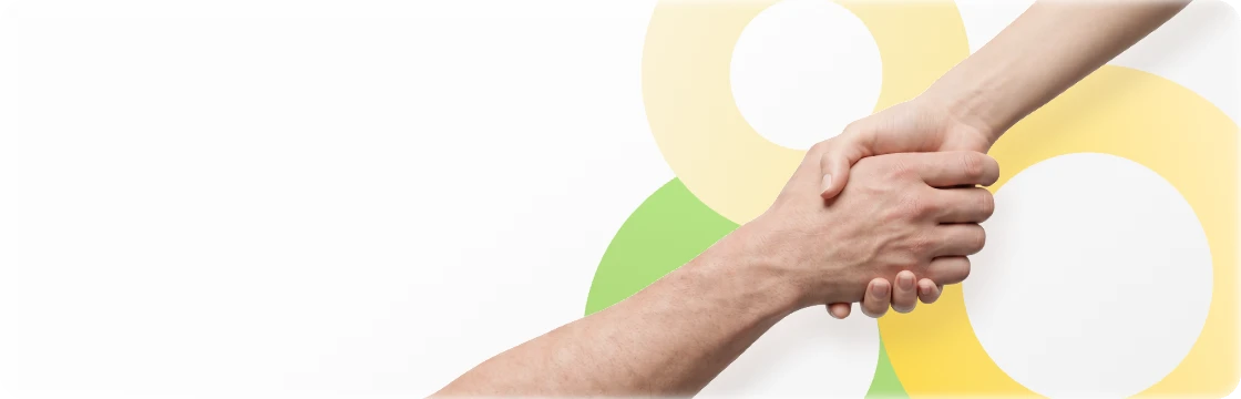 Two makers shaking hands with smiles, symbolizing a successful referral and the shared rewards of the invite‑a‑friend program