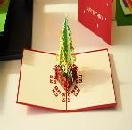 An intricate 3D pop-up greeting card crafted from cardstock laser cut by LaserPecker LP4.