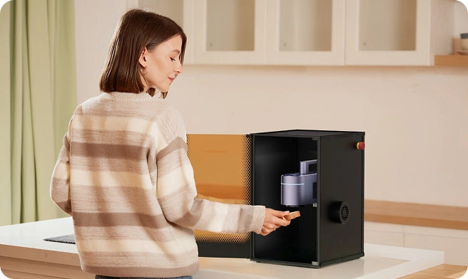 LaserPecker LP4 safety enclosure smart sensor stopping the laser process instantly as the door opens during home crafting.