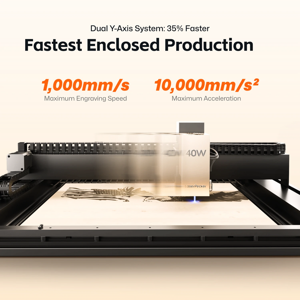 LaserPecker enclosed desktop laser cutter LX2 in action, highlighting its dual Y-axis system for 35% faster production. The machine achieves a maximum engraving speed of 1,000mm/s and maximum acceleration of 10,000mm/s², with a 40W laser head engraving a detailed design on a wooden sheet. 