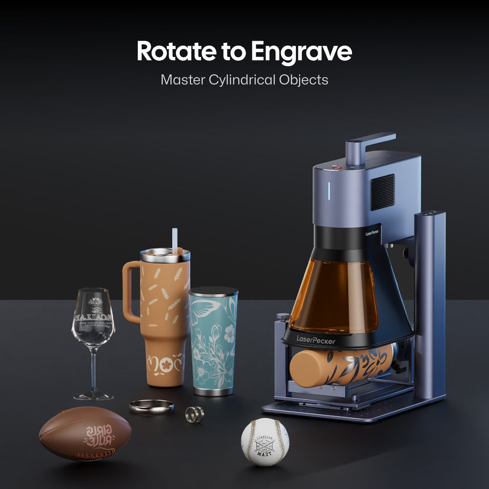 LaserPecker laser engraver with rotary attachment, engraving a tumbler. The display shows the "Rotate to Engrave, Master Cylindrical Objects" feature, alongside examples of engraved items: wine glass, tumblers, football, baseball, and rings.