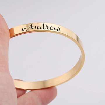 close up of stainless steel cuff bracelet showing polished edges for comfortable wear.