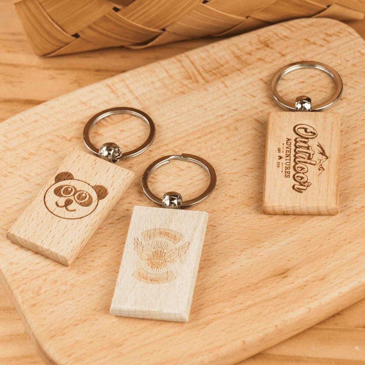 rectangular wooden keychain with laser engraved name and heart for personalized gift bridesmaid proposal.